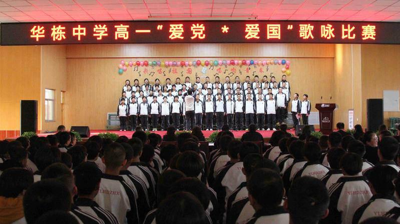 习近平同法国总统马克龙就中法建交60周年互致贺电